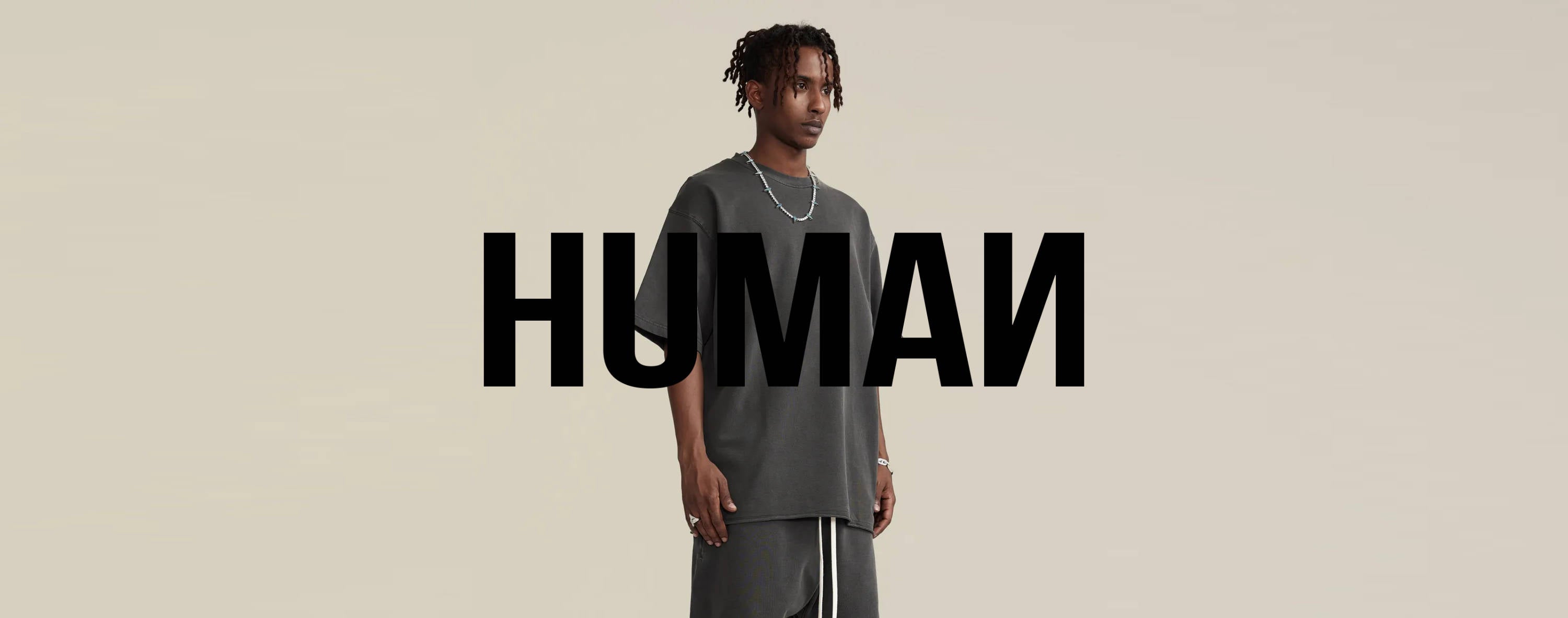 model appears behind human of the future logo